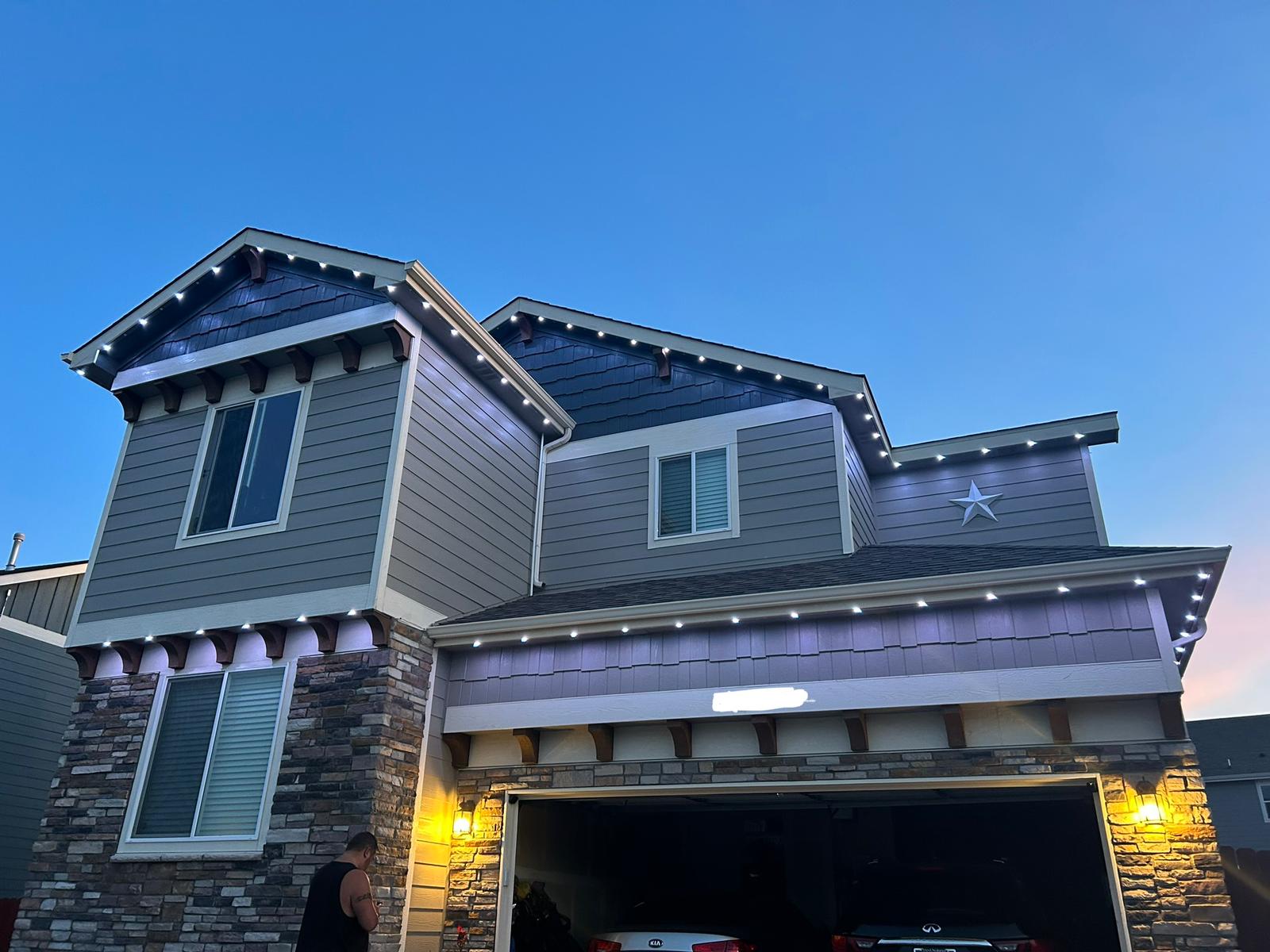 Edmonton suburban house with year-round permanent outdoor lighting system on eaves